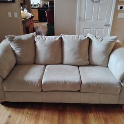 Beige Sofa With Attached Back Cushions 
