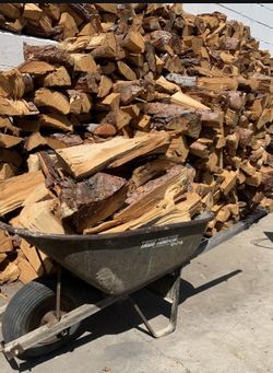 Firewood Ready To Burn Covered Seasoned $20 Dollars A Wheelbarrow 