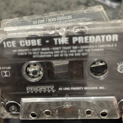 Three ice cube cassette tapes, death certificate and the predator not sure of the last one