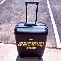 Black luggage sanitized in good condition