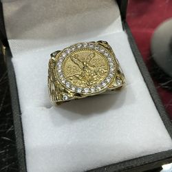 10k gold nugget ring with coin copy. 5.2 grams. Cz stones