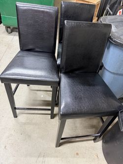 Three Black Counter Stools