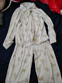 2-piece matching teddy bear print pajama set.