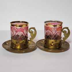2 Vintage Turkish Style Teacups and Saucers Cranberry Glass Brass Holders