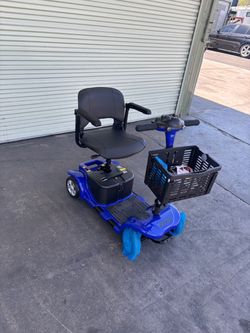 SKRT Mobility Scooter for Adults and Seniors, skmc Rechargeable 4-Wheel Electric Travel Device, Lightweight and Portable, with LED Headlights and Bask