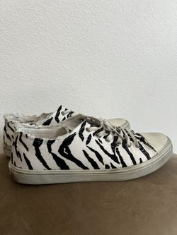 Yves Saint Laurent Distressed Zebra Sneakers