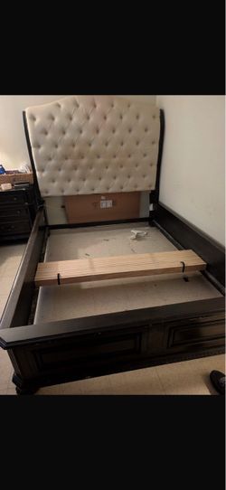 Queen size bed and night table