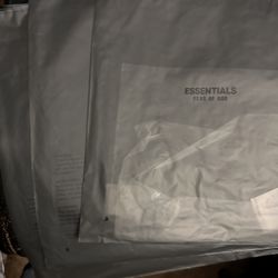 Authentic essentials, garment bags, big enough for sweaters and T-shirts and I have ones that are smaller as well for hats