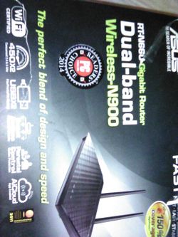 Asus RT-N66U Dual Band Wireless -N900 Gigabit Router. The Dark Knight