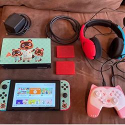 Nintendo Switch Console And Package Comes With Pad And Added Games