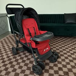 Joovy Caboose Sit & Stand Tandem Double Stroller  In Red