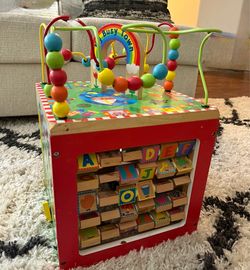 Wooden activity cube