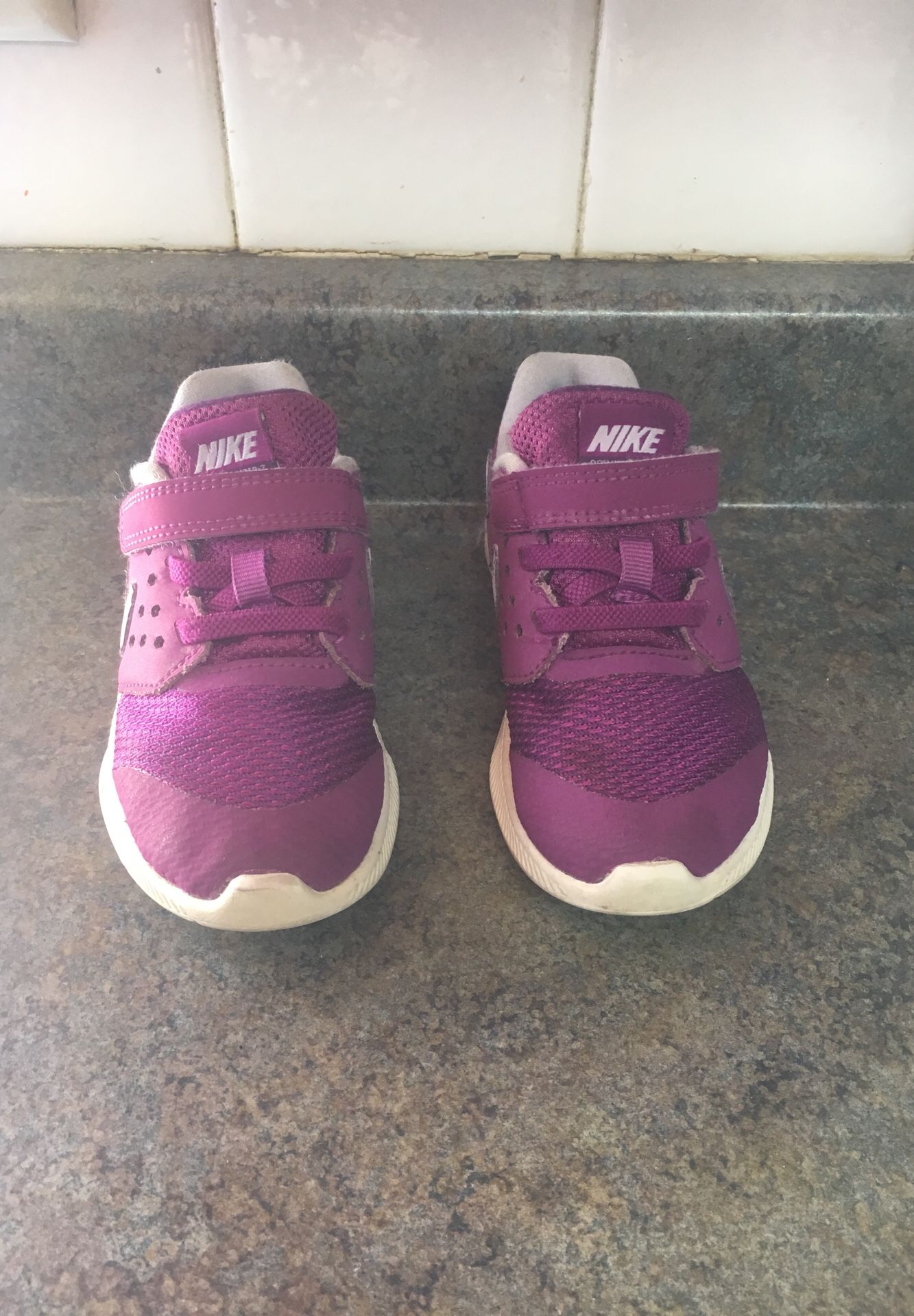 Purple Nike shoes