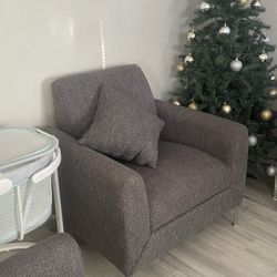 Two Chairs And A Sofa 