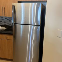 GE. Refrigerator Stove Microwave And Dishwasher 