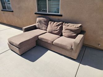 Used brown sofa with ottoman