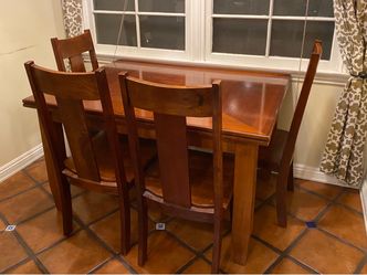 Solid wood dining table and four chairs