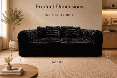 Black Plush Fur Sofa Add a touch of modern luxury to your living space with this oversized black plush fur sofa. Featuring a soft, shaggy texture, de