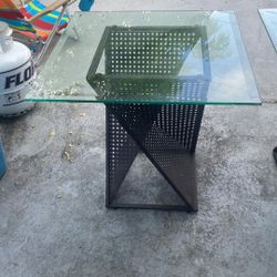 Two aluminum based glass pebble top end tables