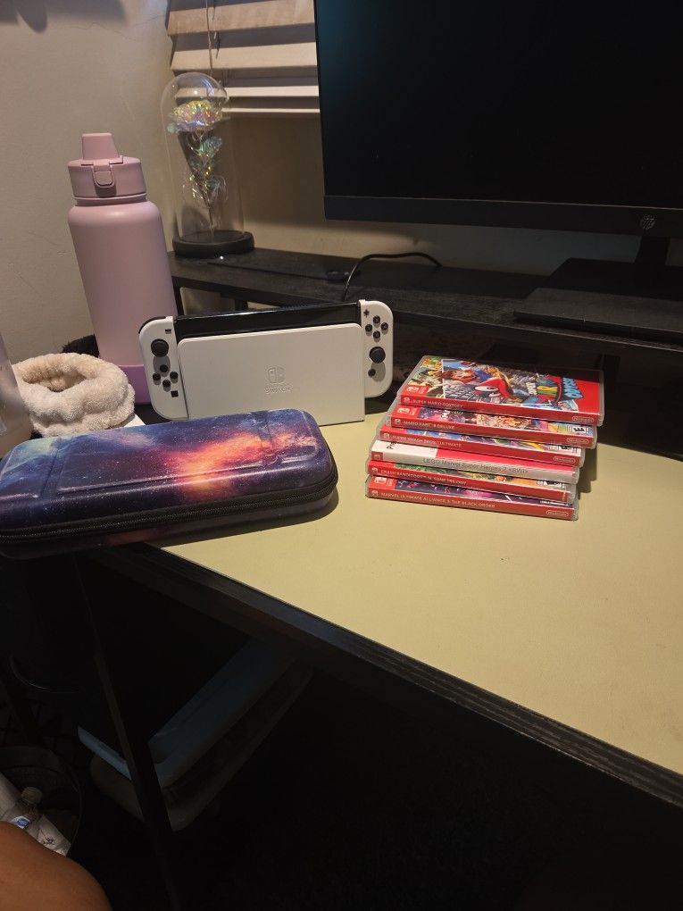 Switch OLED & Games $300