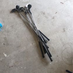 7 Golf Clubs - Various 