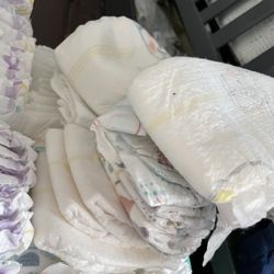 Newborn Clothes And Diapers 