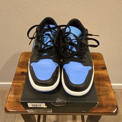 Jordan 1s Black University Blue Low