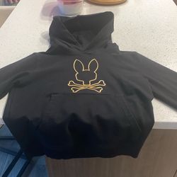 Kids size small psycho bunny gold and black hoodie