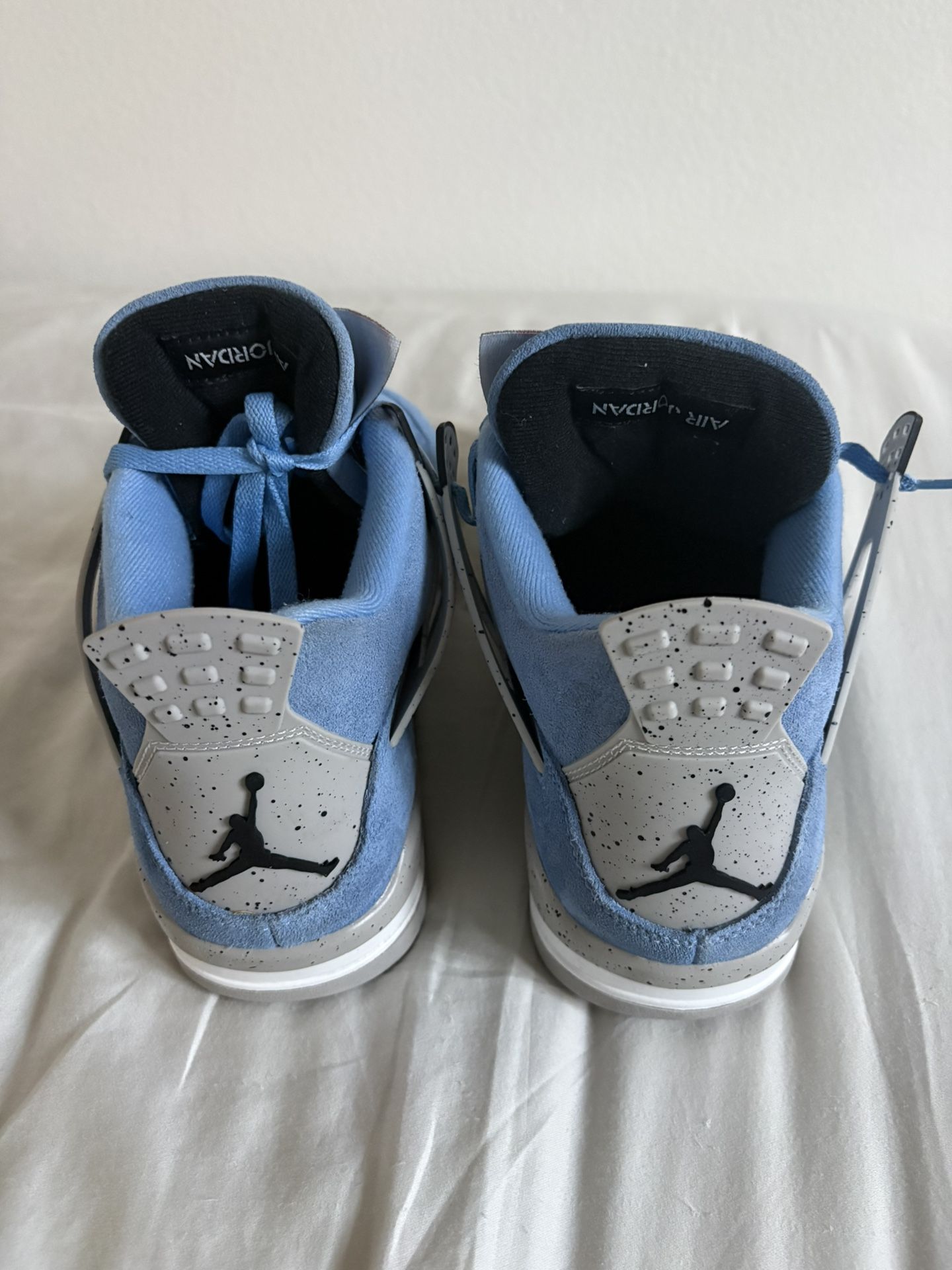 University Blue Jordan 4’s