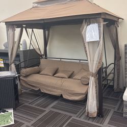 Outdoor Swing with Curtains.    