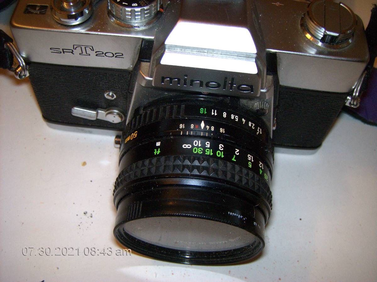 Buy: All 4 together, Minolta SRT 202, Chinon CP-7M macro Af-200 &AF-75-300and carrying begs