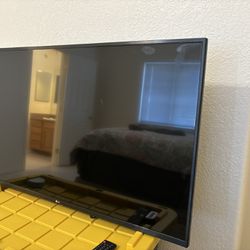 43” LG Television w/ Wall Mount 