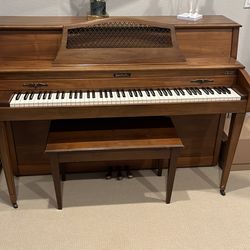 Baldwin piano and bench