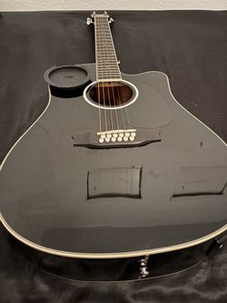 black 12 string acoustic electric asmuse guitar