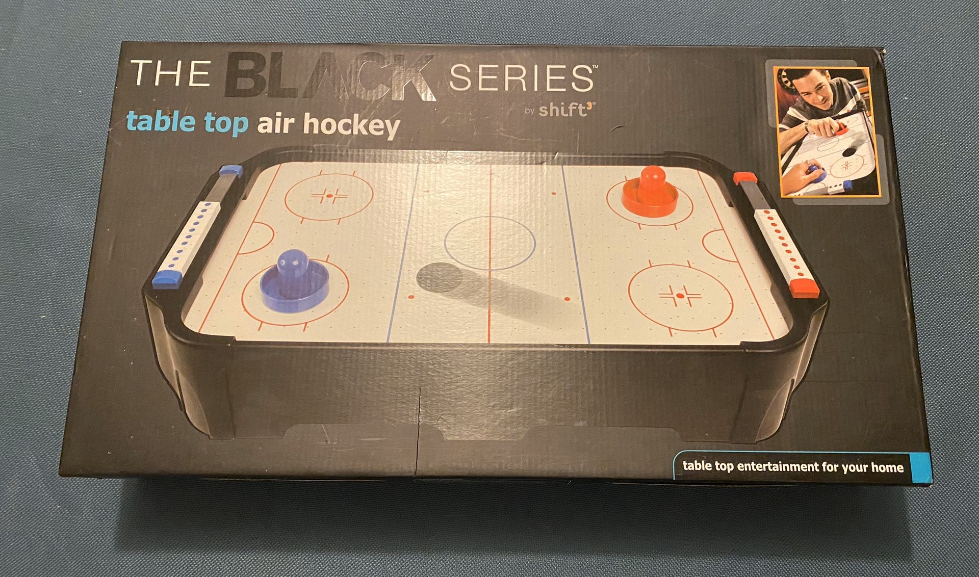 Miniature air hockey table toy