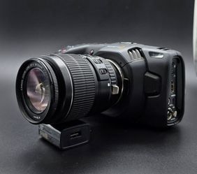 Blackmagic Design 4k Pocket Cinema Camera With Canon 18-55mm lens and Film city camera cage