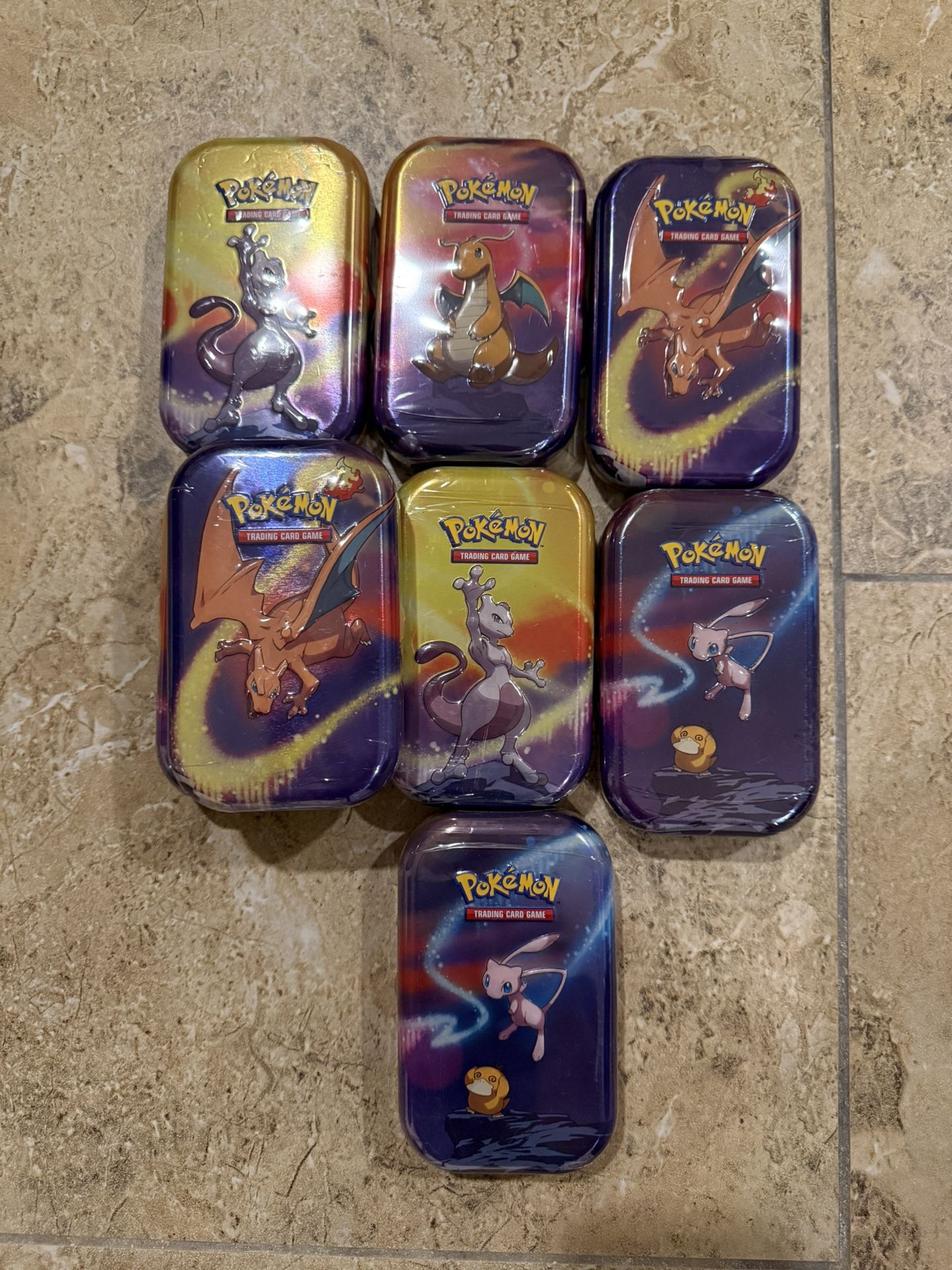 pokmon trading card game kanto power mini tin 151 [Electabuzz & Magnemites]  Common Lands This fantastic tin is easy to open and features Mewtwo in one of five fun Pokmon illustrationsall five form a single image when you line them up Kanto Power Mini Tin -