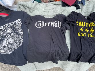 Various women’s tops and tees