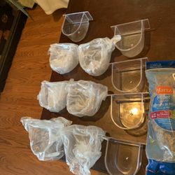 Bird Food & Water Dishes. They Fit On Cage That Has The Opening For Them. 11 Of Them. New. Also A Bag Of Millet