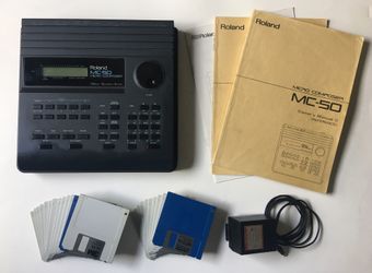 ROLAND MC-50 MICRO COMPOSER + 23 2DD FLOPPY DISKS + 3 MANUALS + POWER ADAPTER
