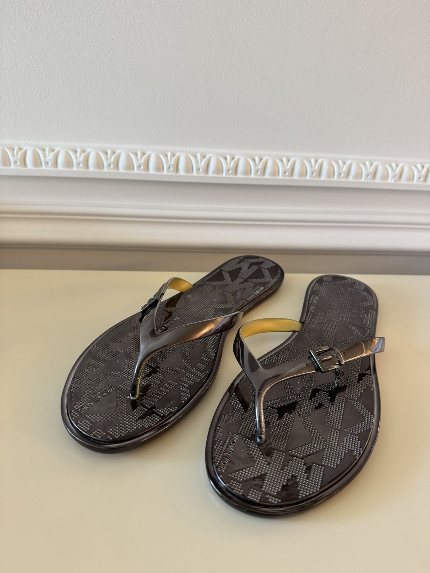 Michael Kors flip flops