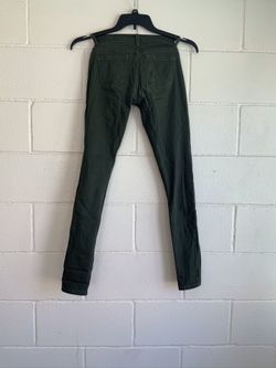 Green skinny jeans