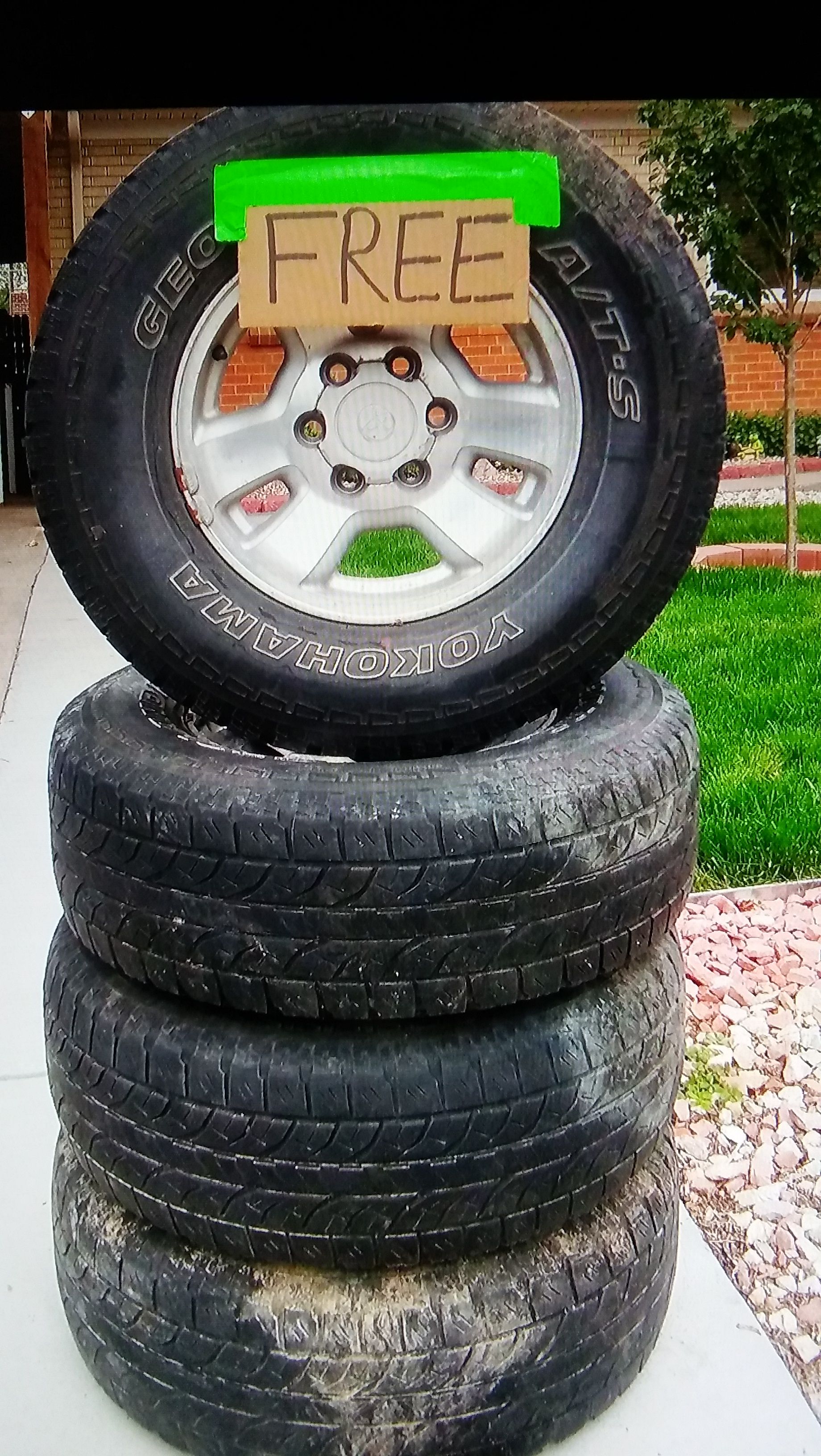 FREE!! 4 USED TIRES AND RIMS FOR A 97 4RUNNER