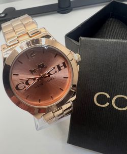 Rose gold coach watch