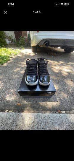 Air Jordan 11 Black Patent Leather Sneakers