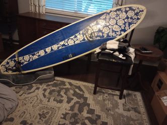 Surfboard (7.8 longboard) with carry sack