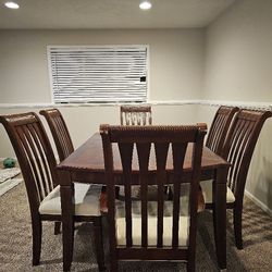 6 Seat Dining Table With An Extension Piece