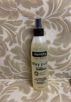 Identity stay put hair spray