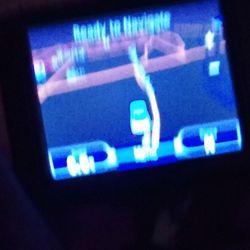 Garmin Nuvi 205  works well I just got the mount for my cell phone in the car so I don't need it anymore