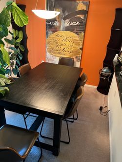 Wooden table plus chairs
